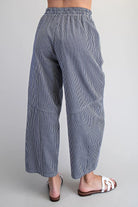 Back view of navy striped cropped wide leg pants