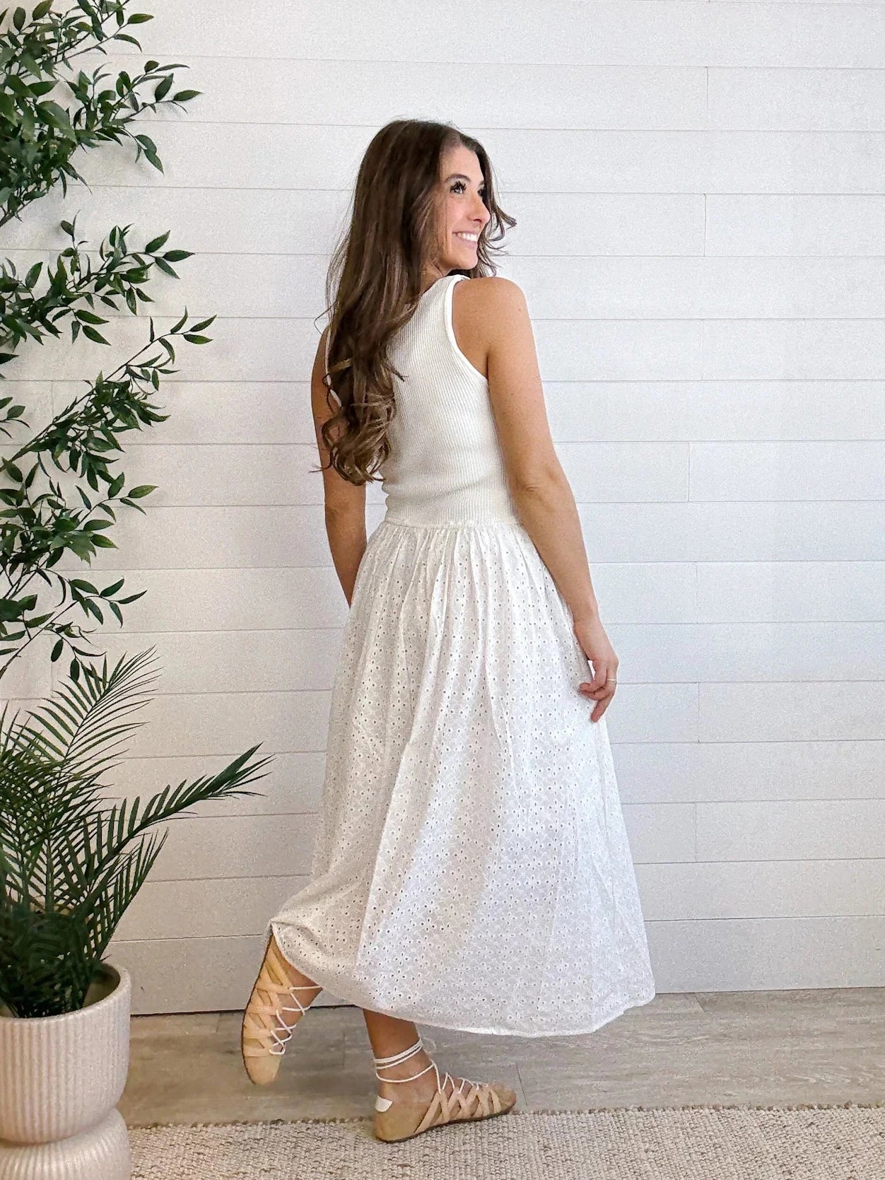 woman modeling the back of Mixed Media Eyelet Midi Dress in white