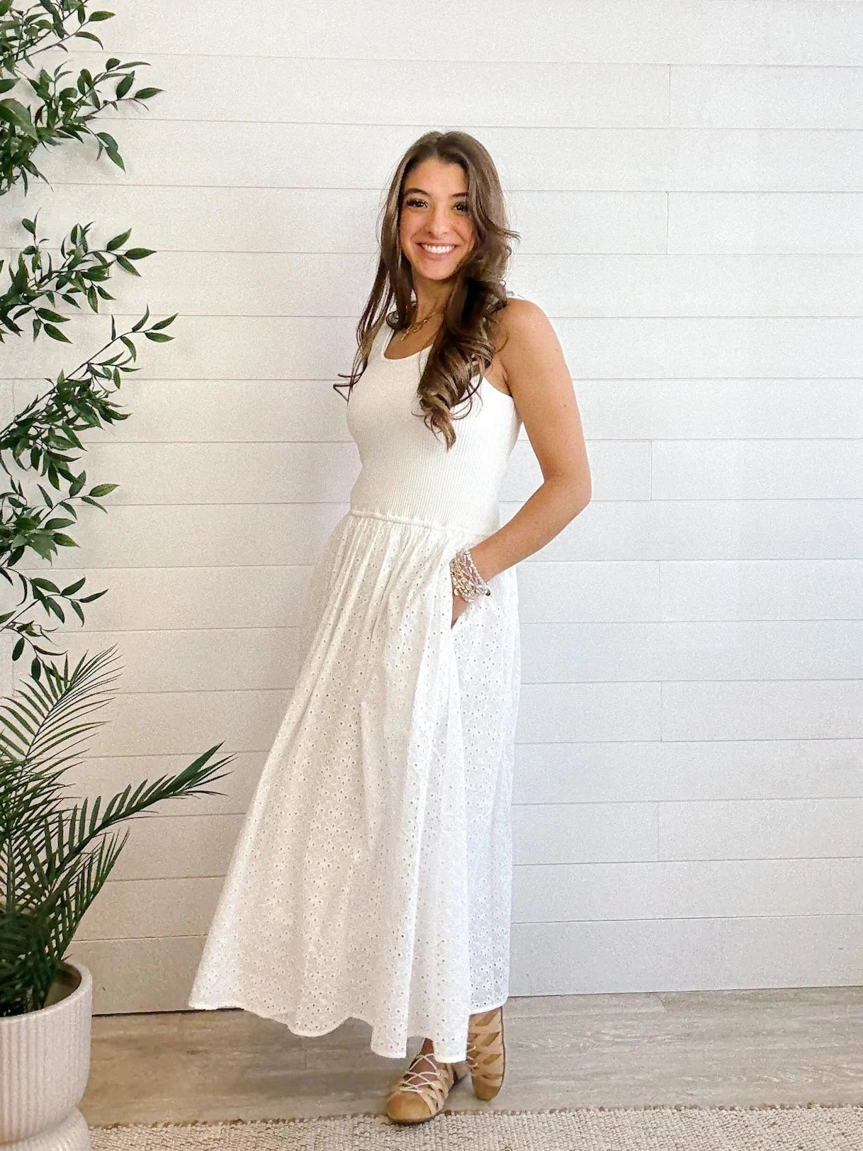 woman modeling the Mixed Media Eyelet Midi Dress in white