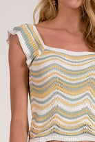 details on white multi knit tank with ruffle cap sleeve
