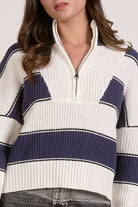close up view of Wide stripe half zip sweater in navy and white with ribbed knit texture and relaxed fit